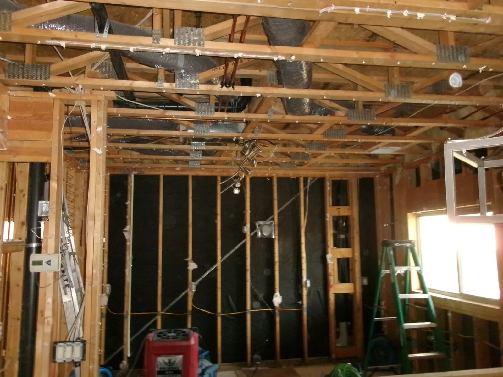 Structural framing during an insurance repair in Phoenix, AZ